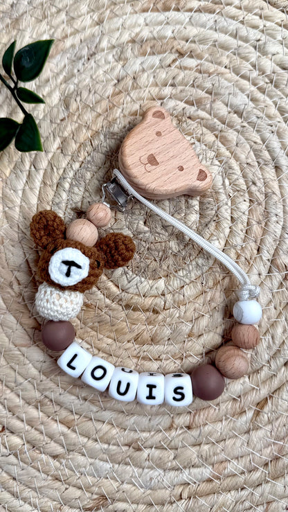 Attache-tétine bébé brun en bois et silicone, sécurisée avec clip ourson